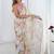 Off white floral sequinned pure chiffon saree