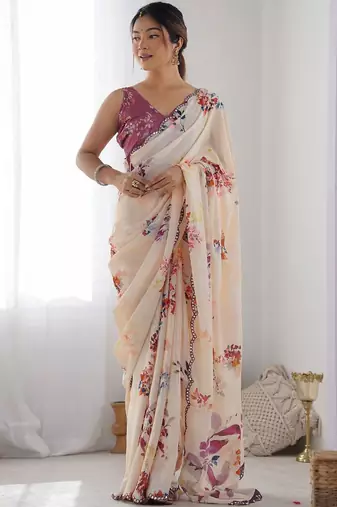 Cream floral mirror work pure chiffon saree