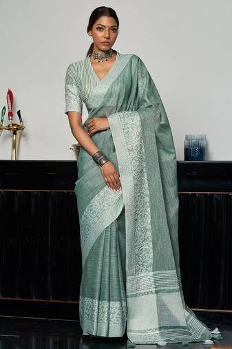 Green woven design zari saree
