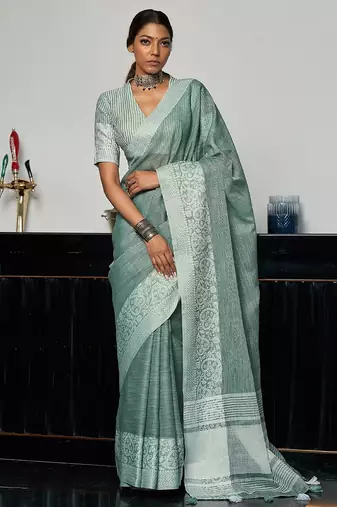 Green woven design zari saree