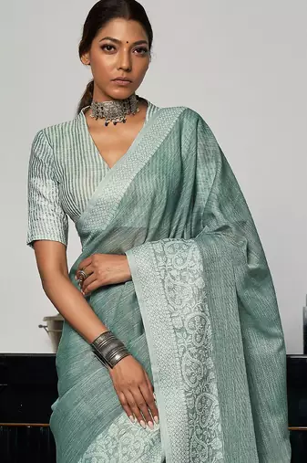 Green woven design zari saree