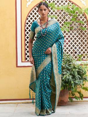Green woven design zari silk blend saree 1