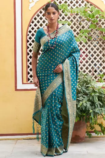 Green woven design zari silk blend saree