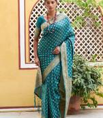 Green woven design zari silk blend saree