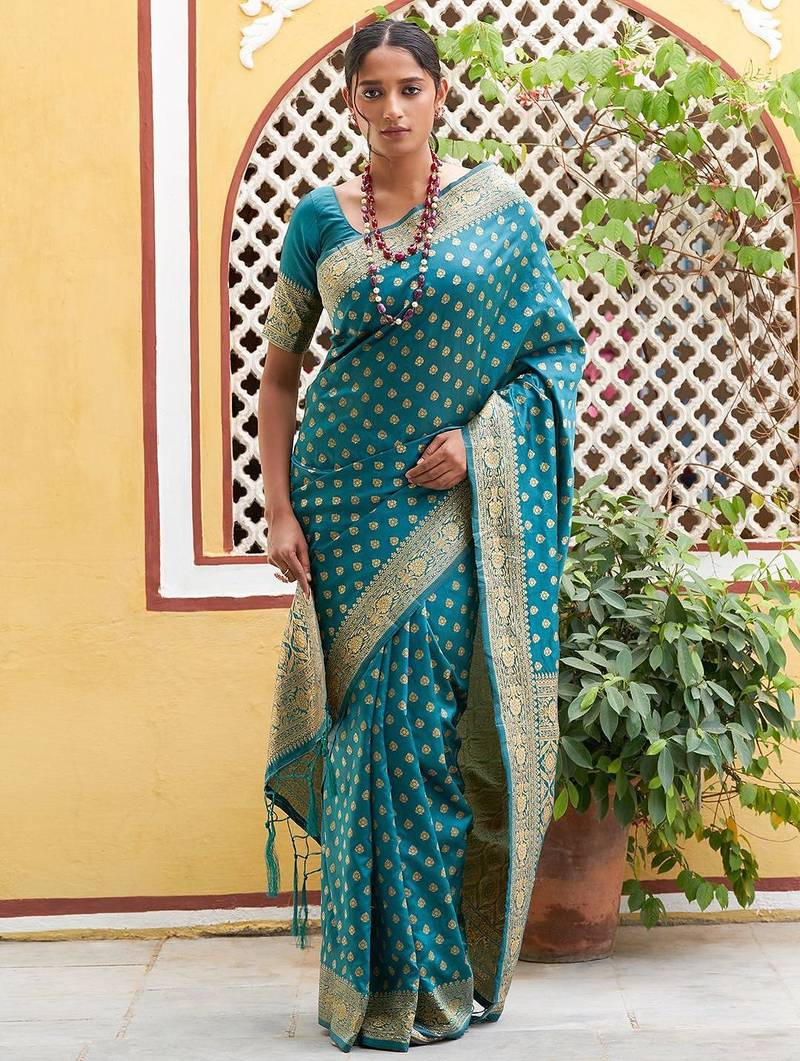 Green woven design zari silk blend saree