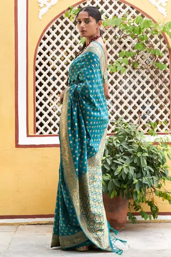 Green woven design zari silk blend saree