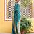 Green woven design zari silk blend saree