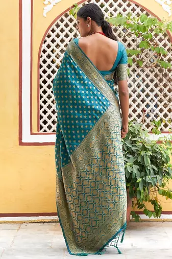 Green woven design zari silk blend saree