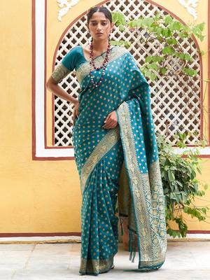 Green woven design zari silk blend saree 4