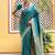 Green woven design zari silk blend saree