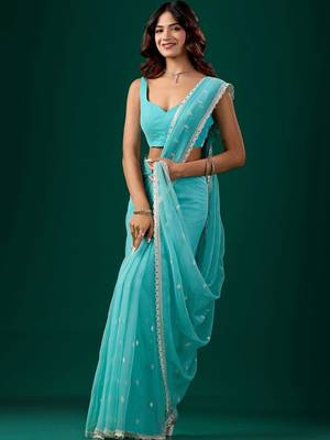Turquoise woven design embroidered pure chiffon saree 1