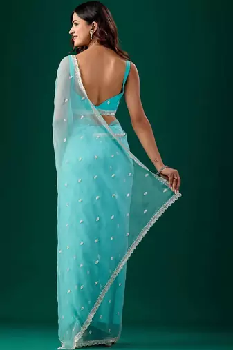 Turquoise woven design embroidered pure chiffon saree