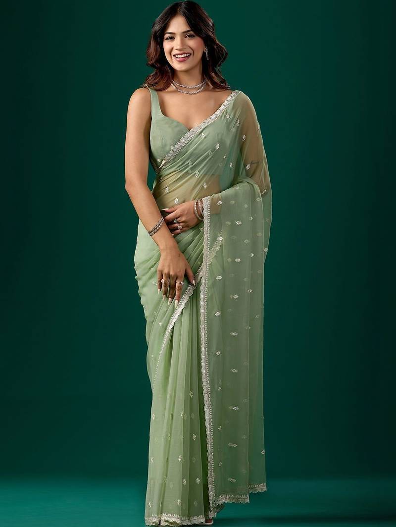 Sea green woven design embroidered pure chiffon saree