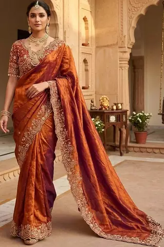 Orange woven design embroidered satin fusion saree