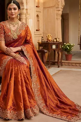 Orange woven design embroidered satin fusion saree
