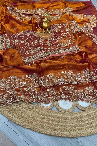 Orange woven design embroidered satin fusion saree