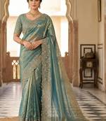Teal woven design embroidered satin fusion saree