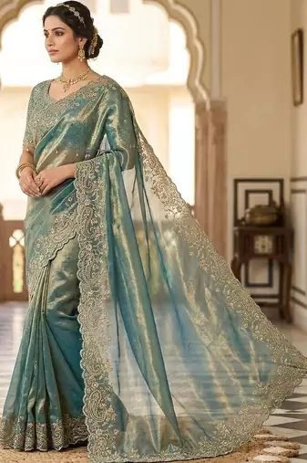 Teal woven design embroidered satin fusion saree