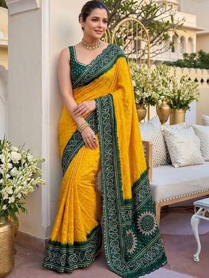 Yellow bandhani mirror work pure georgette leheriya saree 1