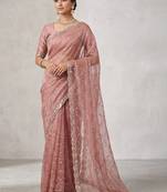 Peach tie and dye tissue saree