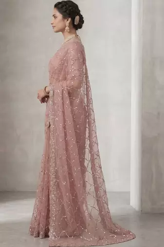 Peach tie and dye tissue saree