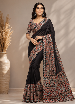 Dark Brown Color Ajarakh Print With Mirror Work And Beautiful Tussle Crepe Silk Saree 1