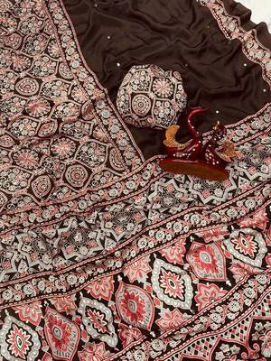 Dark Brown Color Ajarakh Print With Mirror Work And Beautiful Tussle Crepe Silk Saree 2