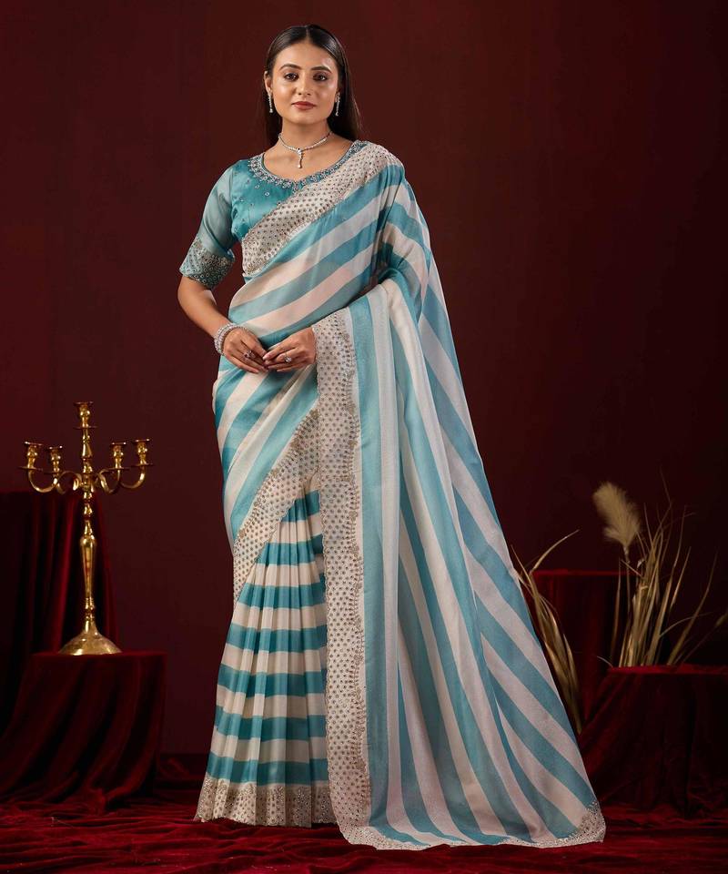 soft silk teal blue stone and bead embroidery border chiffon saree with unstitched blouse