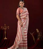 celebrity type light peach stone and bead embroidery border chiffon saree with unstitched blouse