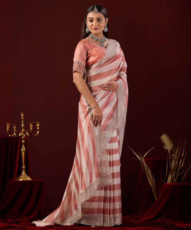 celebrity type light peach stone and bead embroidery border chiffon saree with unstitched blouse