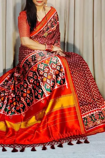 Maroon Color Lagadi Patta And Weaved Zari Border Work Silk Patola Saree