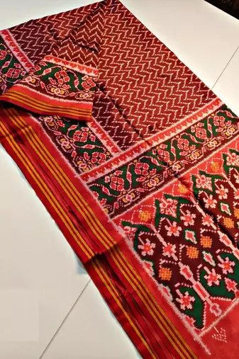 Maroon Color Lagadi Patta And Weaved Zari Border Work Silk Patola Saree