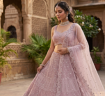  Elegant Dusty Pink Bridal Lehenga Choli with Heavy Embroidery and Net Dupatta