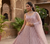  Elegant Dusty Pink Bridal Lehenga Choli with Heavy Embroidery and Net Dupatta