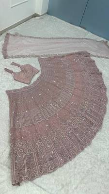  Elegant Dusty Pink Bridal Lehenga Choli with Heavy Embroidery and Net Dupatta 4