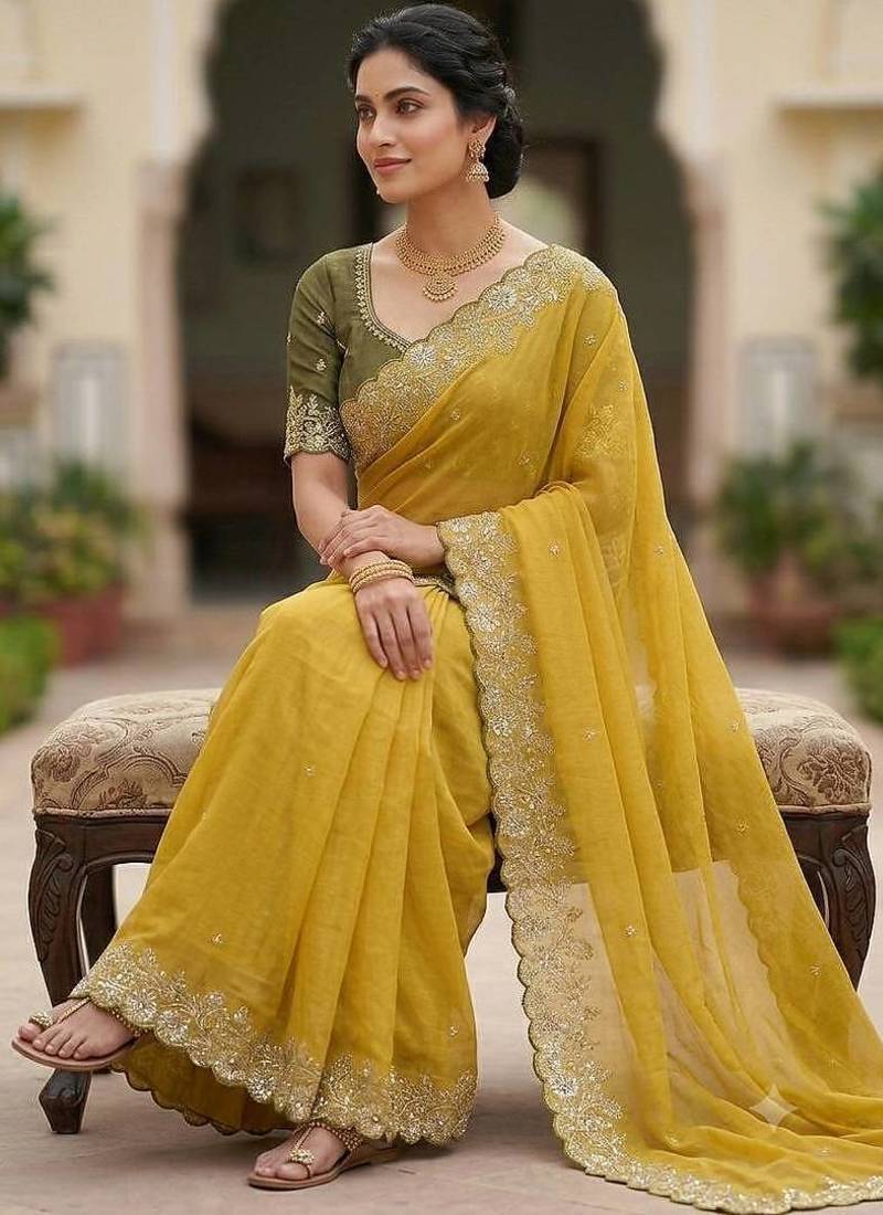 Yellow Color Embroidery Thread And Zari Work Georgette Saree