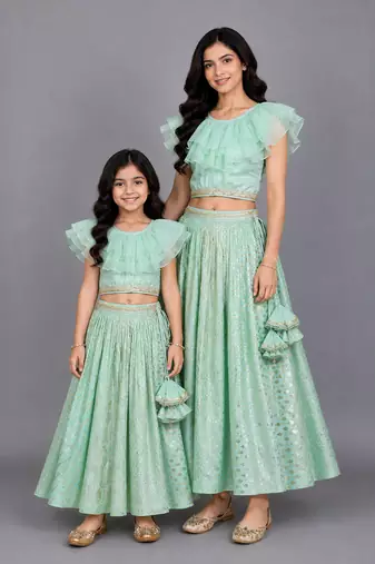 Mother daughter pastel green organza frill chanderi lehenga set