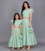 Mother daughter pastel green organza frill chanderi lehenga set