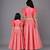 Mother daughter coral pink ruffled blouse with cotton zari lehenga set