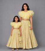 Mother daughter lime yellow organza frill chanderi lehenga set