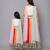 Mother daughter printed lehenga set with attached dupatta