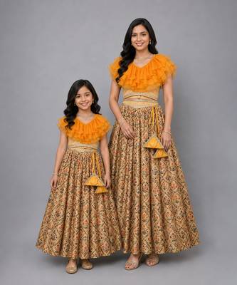 Mother daughter golden orange frill printed lehenga set 1