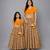 Mother daughter golden orange frill printed lehenga set