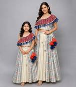 Mother daughter off white printed off shoulder ruffled blouse lehenga set