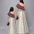 Mother daughter off white printed off shoulder ruffled blouse lehenga set