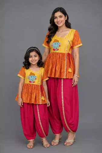 Mother daughter embroidered orange yellow dhoti set