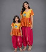 Mother daughter embroidered orange yellow dhoti set