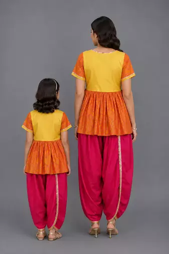 Mother daughter embroidered orange yellow dhoti set