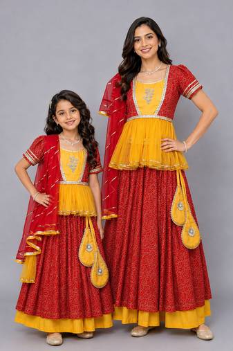 Mother daughter orange yellow peplum blouse lehenga set