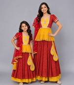 Mother daughter orange yellow peplum blouse lehenga set